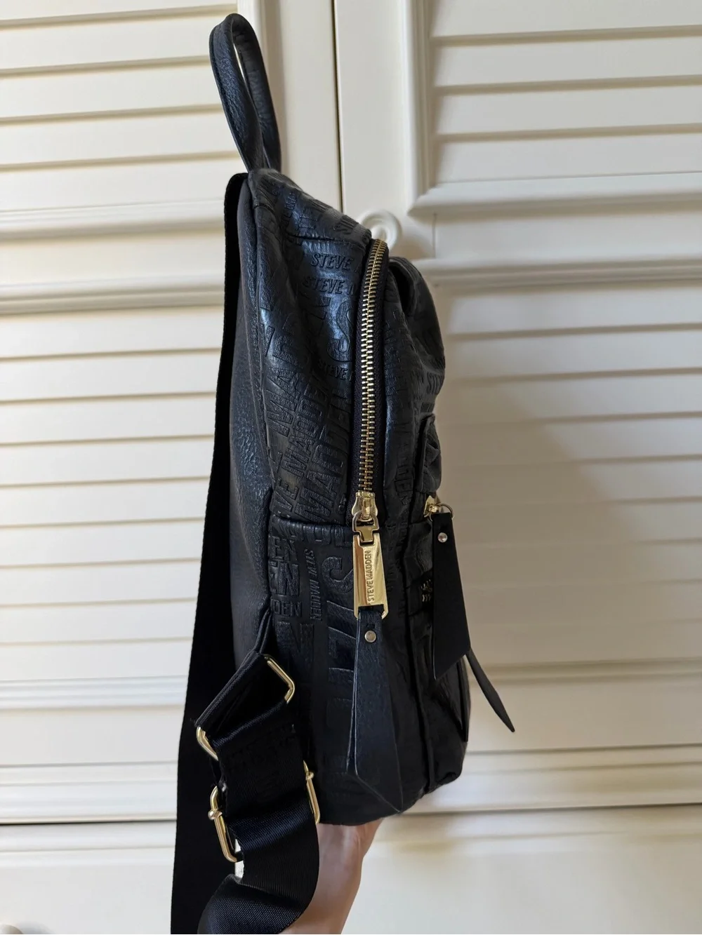 Steve Madden Black Embossed Mini Backpack with Gold Zippers